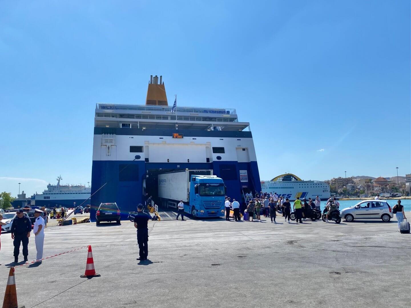 Passengers and vehicles being loaded onto a Blue Star ferry at Piraeus Athens