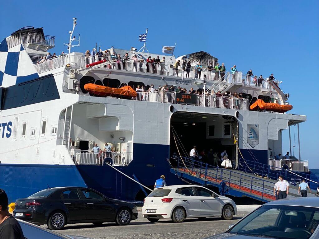 Seajets ferry arriving at Mykonos with passengers waiting to disembark