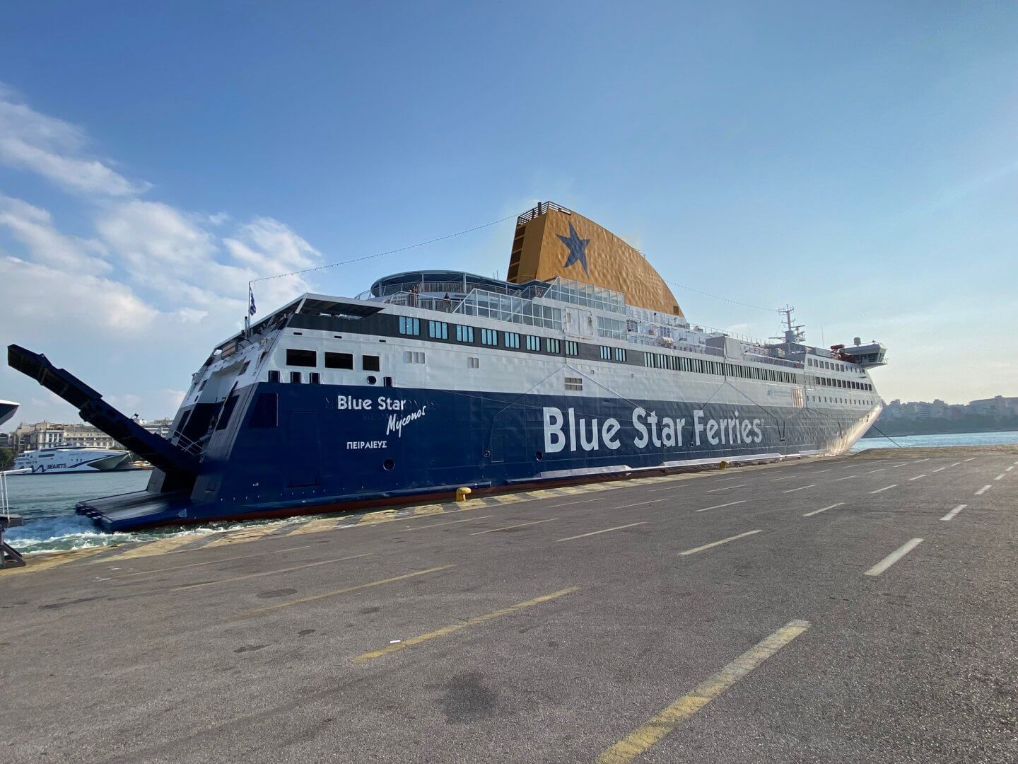 Blue Star Mykonos boat departing from Athens, raising gangway